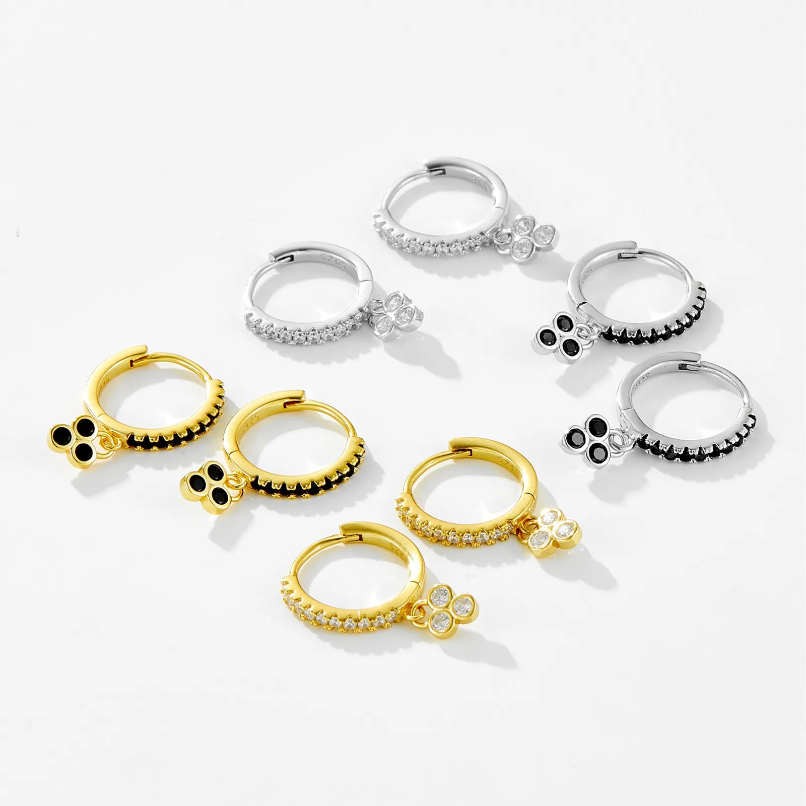 Juliette Triple Stone Earrings in gold finish with white crystals