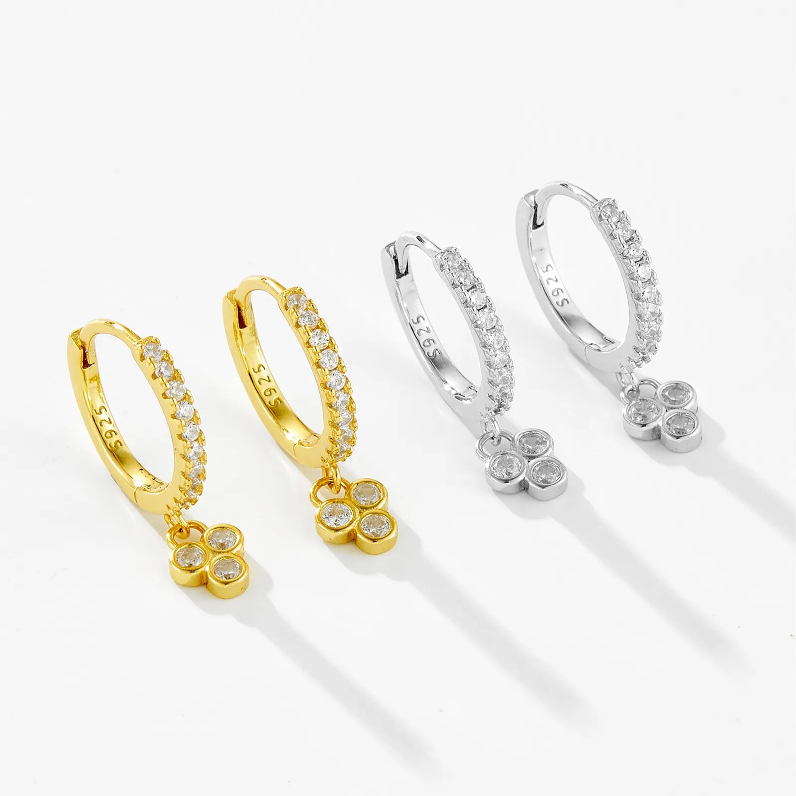 Juliette Triple Stone Earrings in gold finish with white crystals