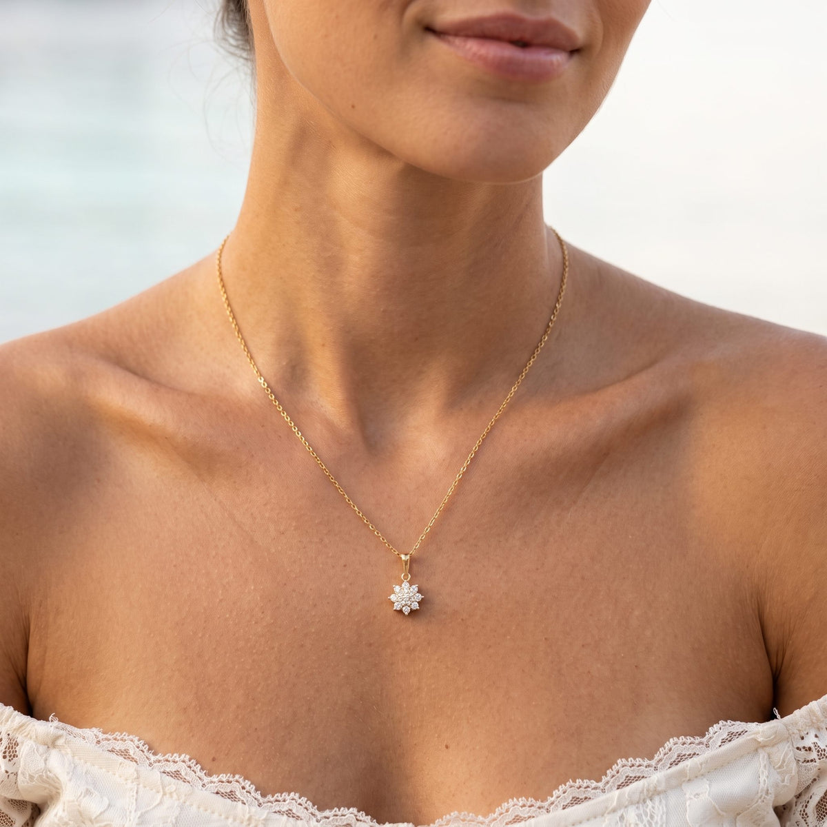 Wider view of a woman wearing the Bloom Cluster Pendant