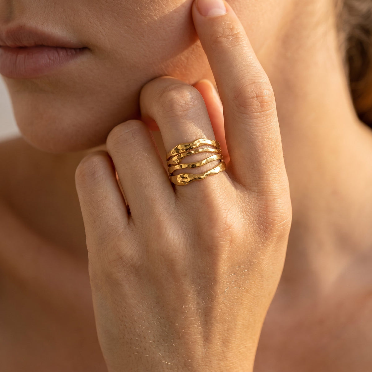 Wider view of a hand wearing the Cascata Ring