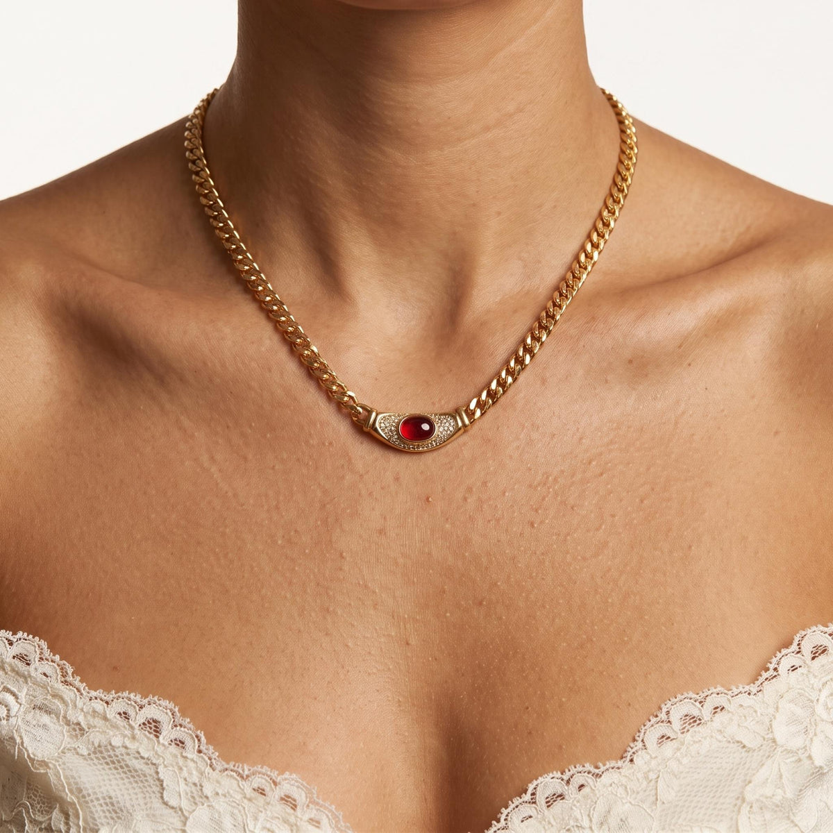 Close-up of the Crescent Plaque Necklace worn on the neckline
