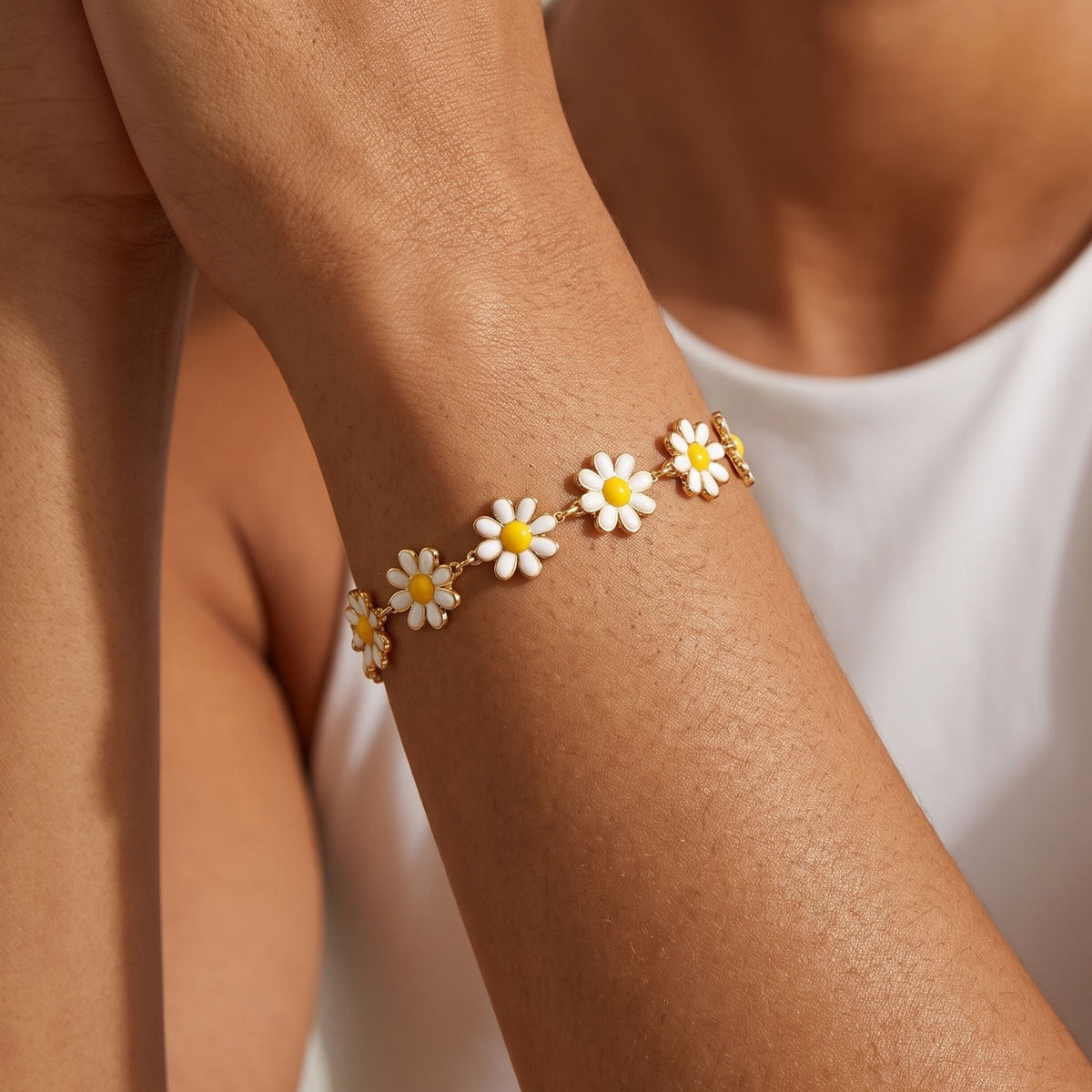 Daisy Chain Bracelet worn on the wrist, photographed in natural daylight.