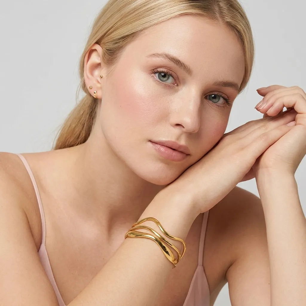 Emma Wave Gold Bangle