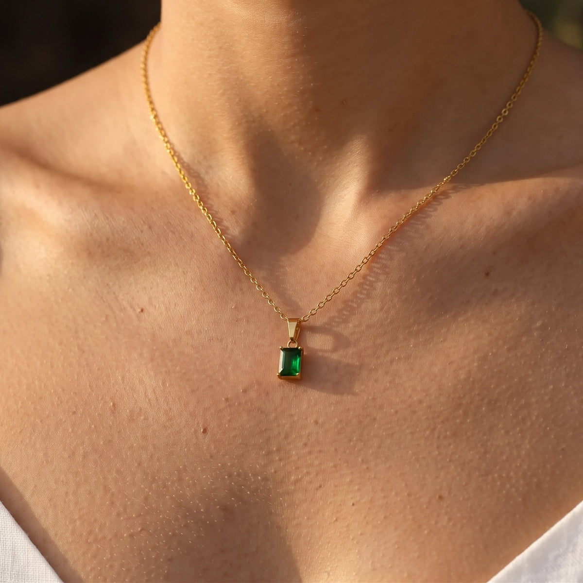 Close-up of the Emerald Cut Pendant worn on the neckline