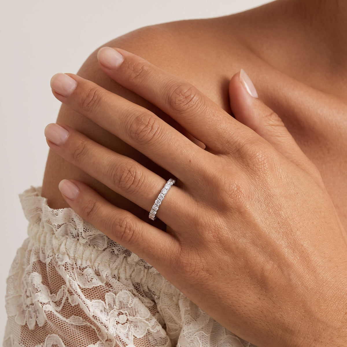 Wider view of a hand wearing the Eternity Ring