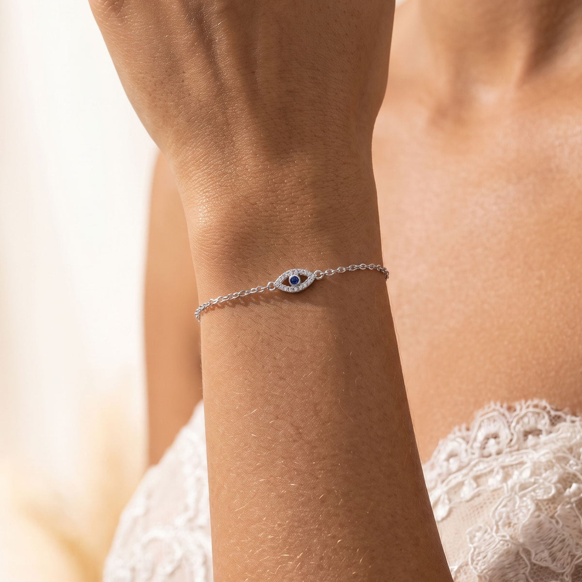 Evil Eye Bracelet worn on the wrist, photographed in natural daylight.