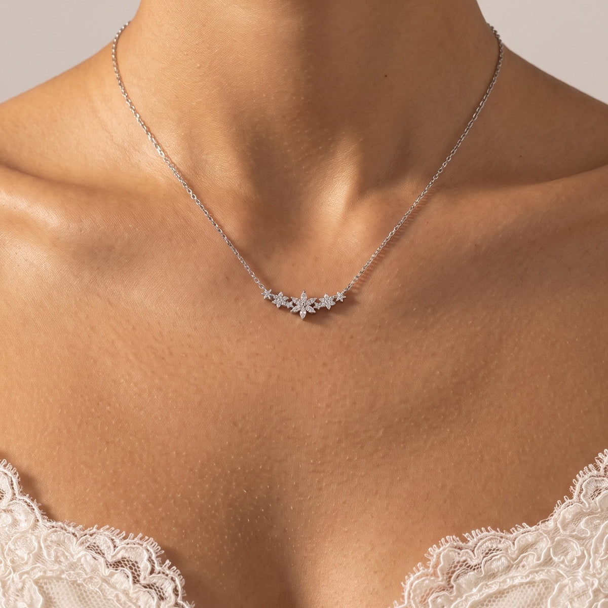Close-up of the Flower Bar Necklace worn on the neckline