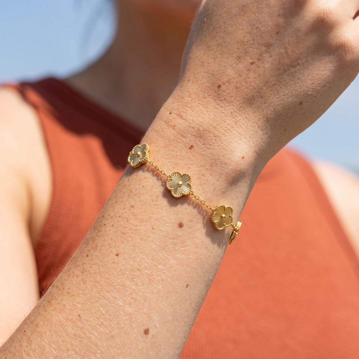 Fluted Bloom Bracelet worn on the wrist, photographed in natural daylight.