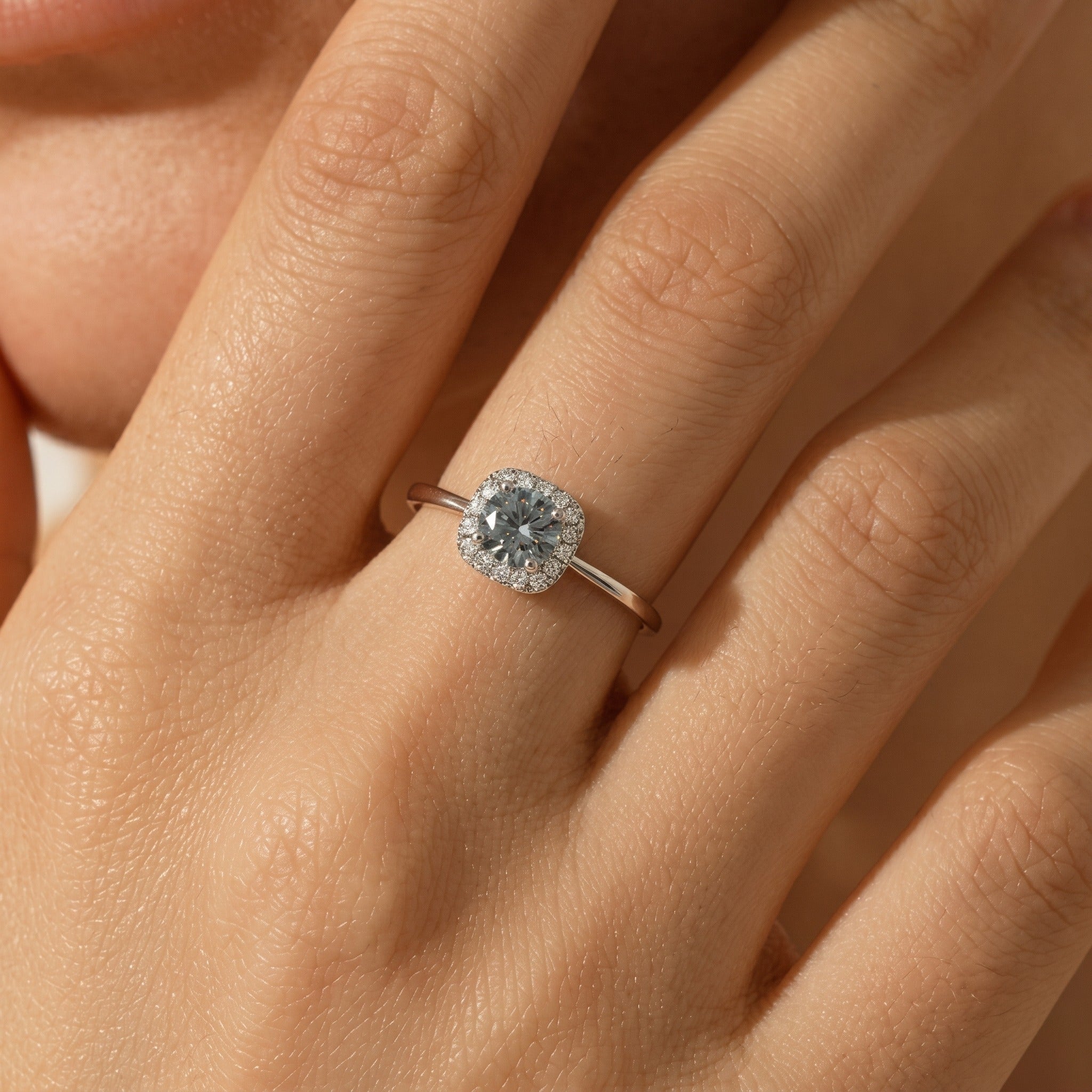 Isabelle Halo Silver Ring in sterling silver with sparkling crystal halo