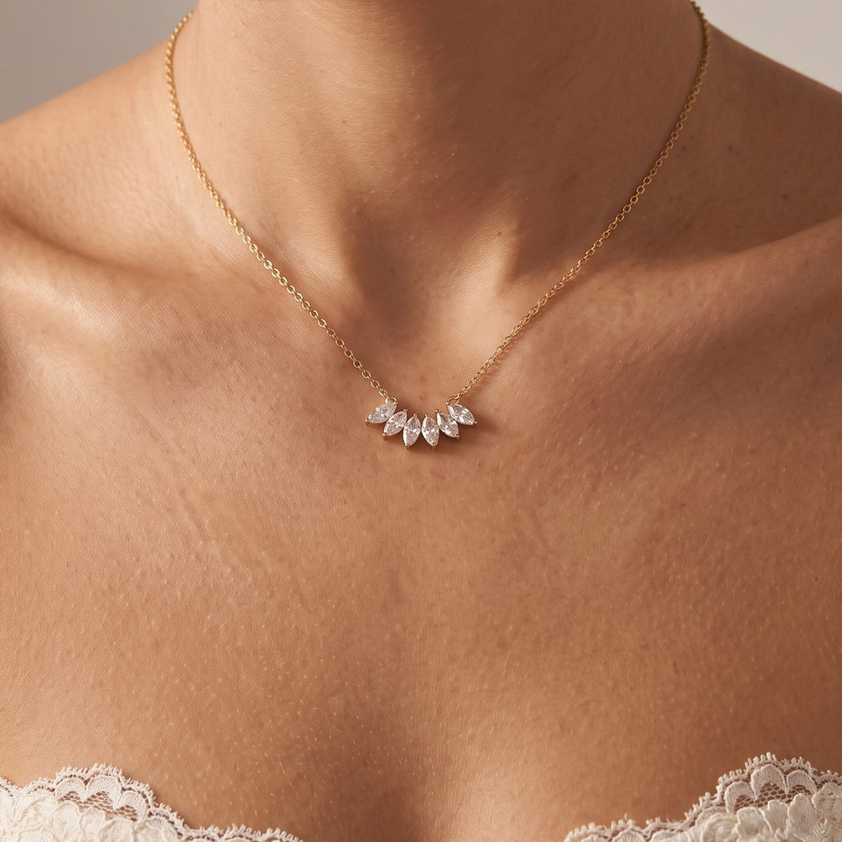 Close-up of the Marquise Fan Necklace worn on the neckline