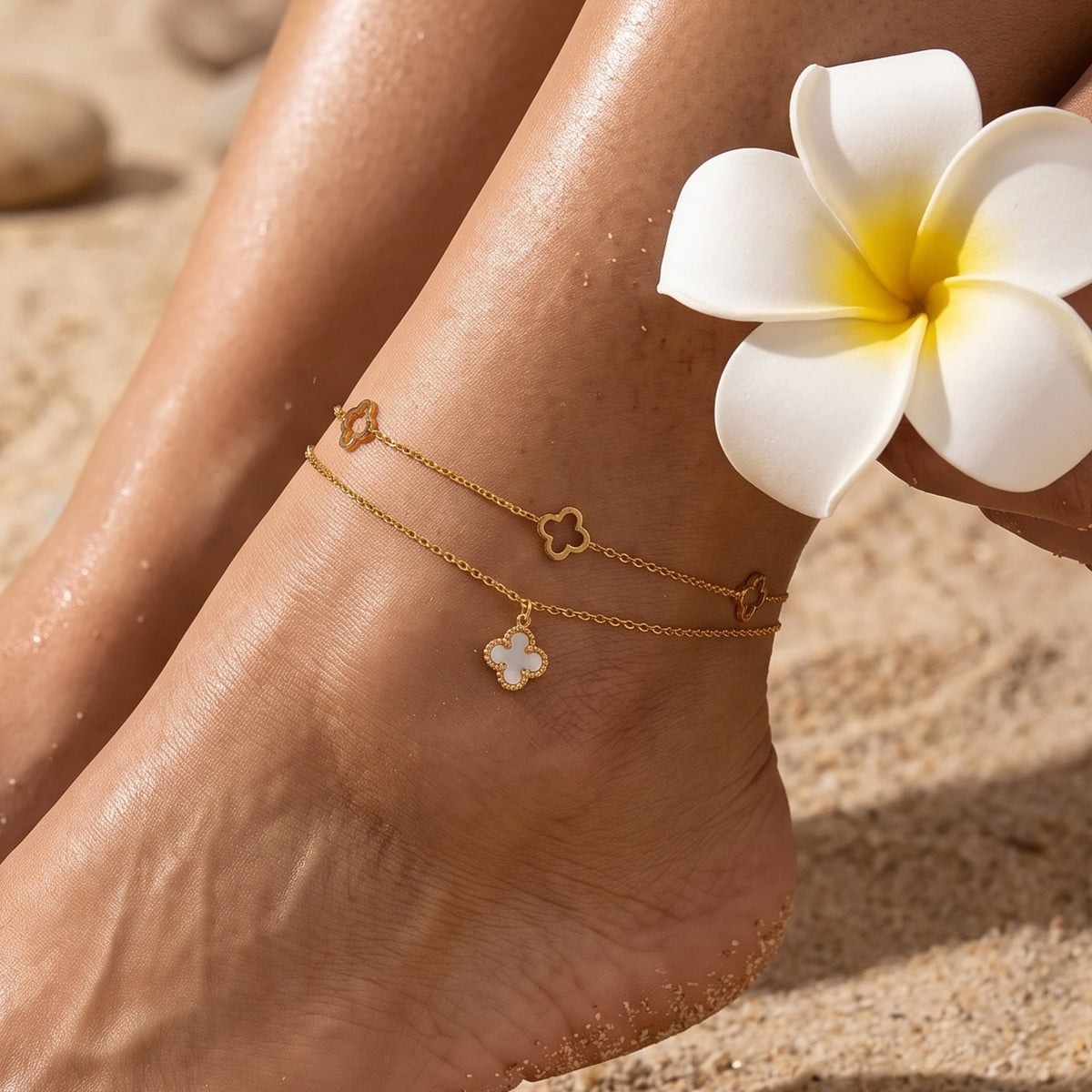Close-up of the Shell Clover Anklet worn on the ankle