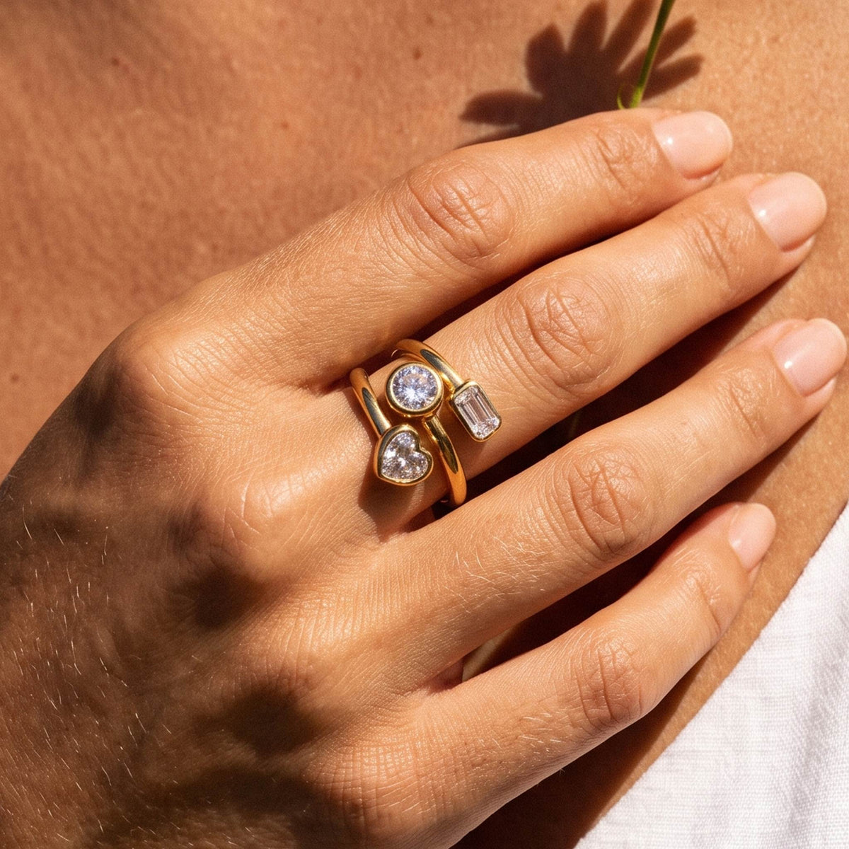 Close-up of the Spiral Trio Ring worn on the finger