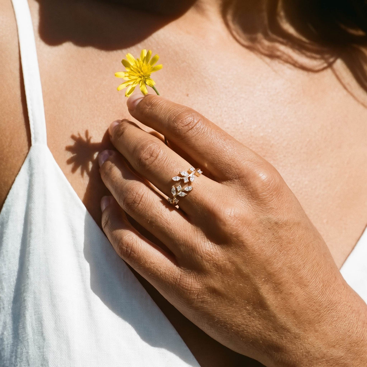 Wider view of a hand wearing the Vine Leaf Ring