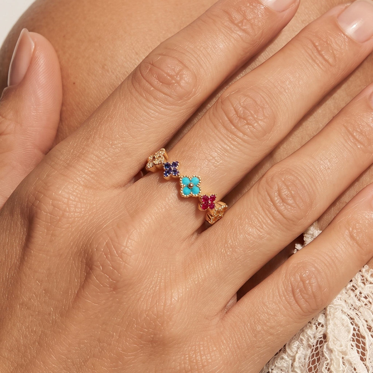 Close-up of the Wildflower Ring worn on the finger