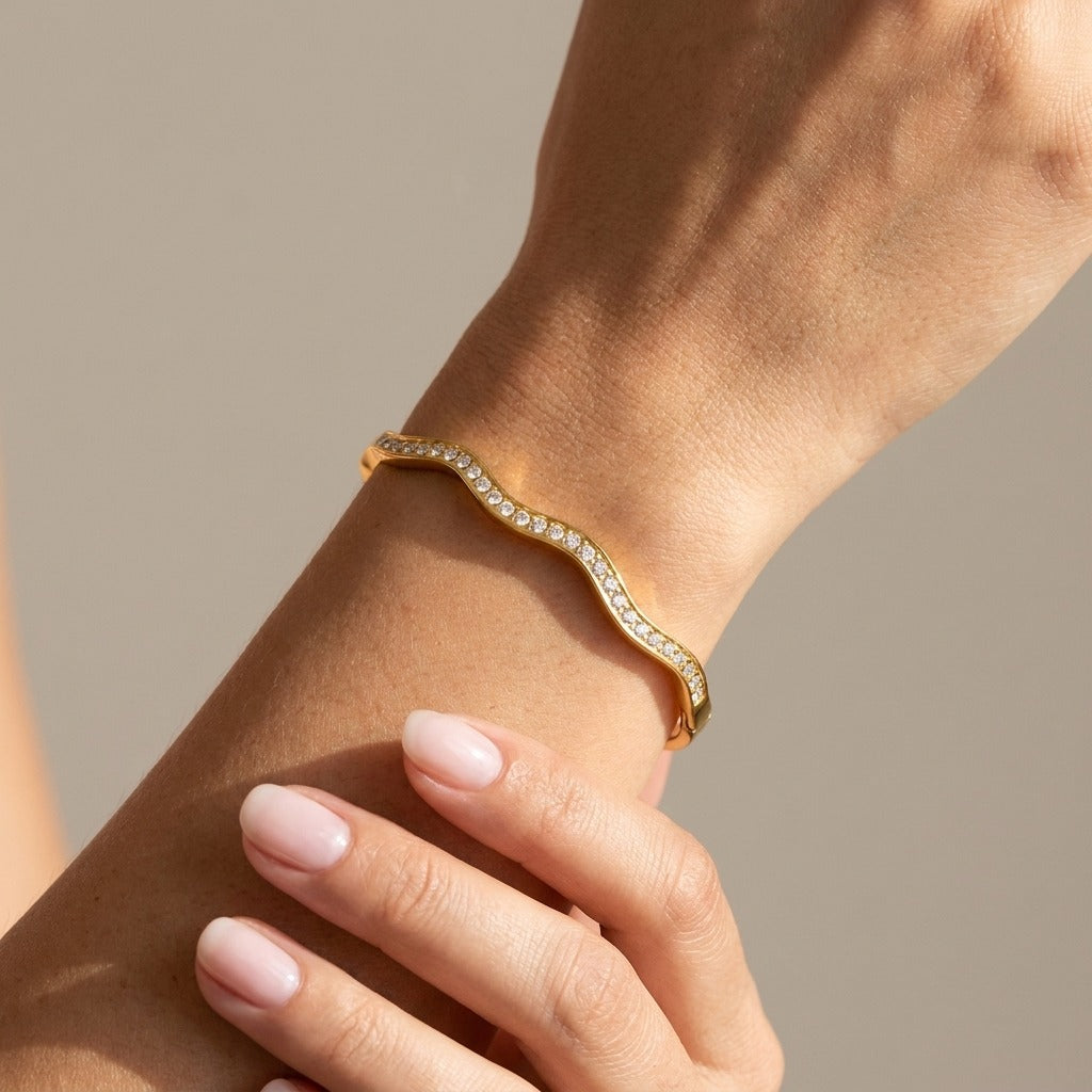 Amelie Wave Crystal Bangle with sparkling zircon details