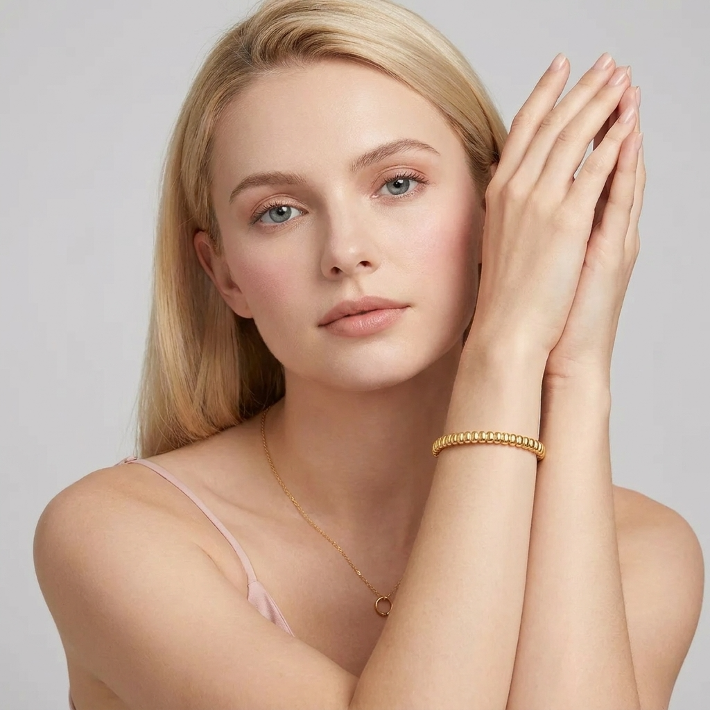 Emma Sculpted Gold Bangle with sparkling zircon details
