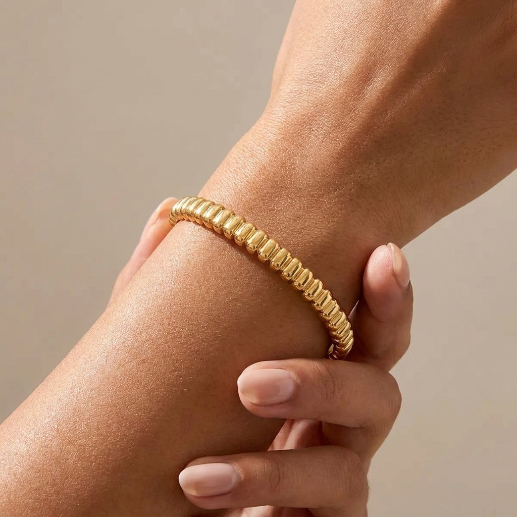 Emma Sculpted Gold Bangle with sparkling zircon details