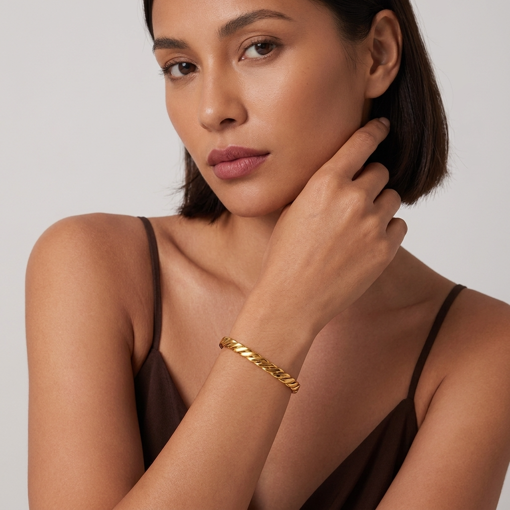 Emma Twist Bold Gold Bangle with Sparkling Zircon Stones