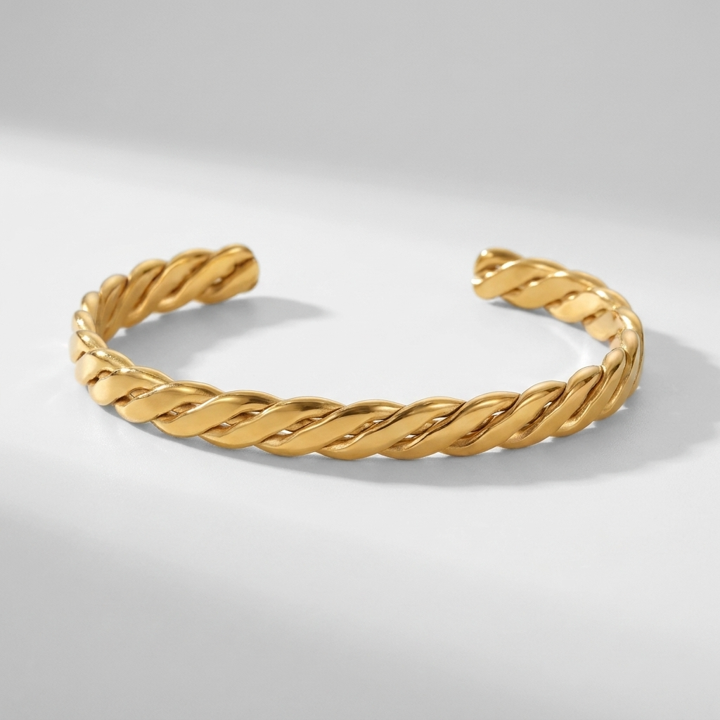 Emma Twist Bold Gold Bangle with Sparkling Zircon Stones