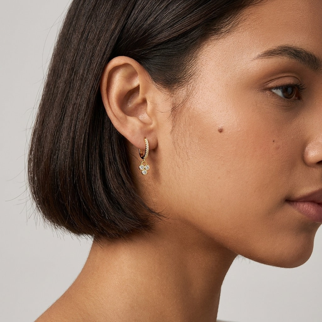Juliette Triple Stone Earrings in gold finish with white crystals
