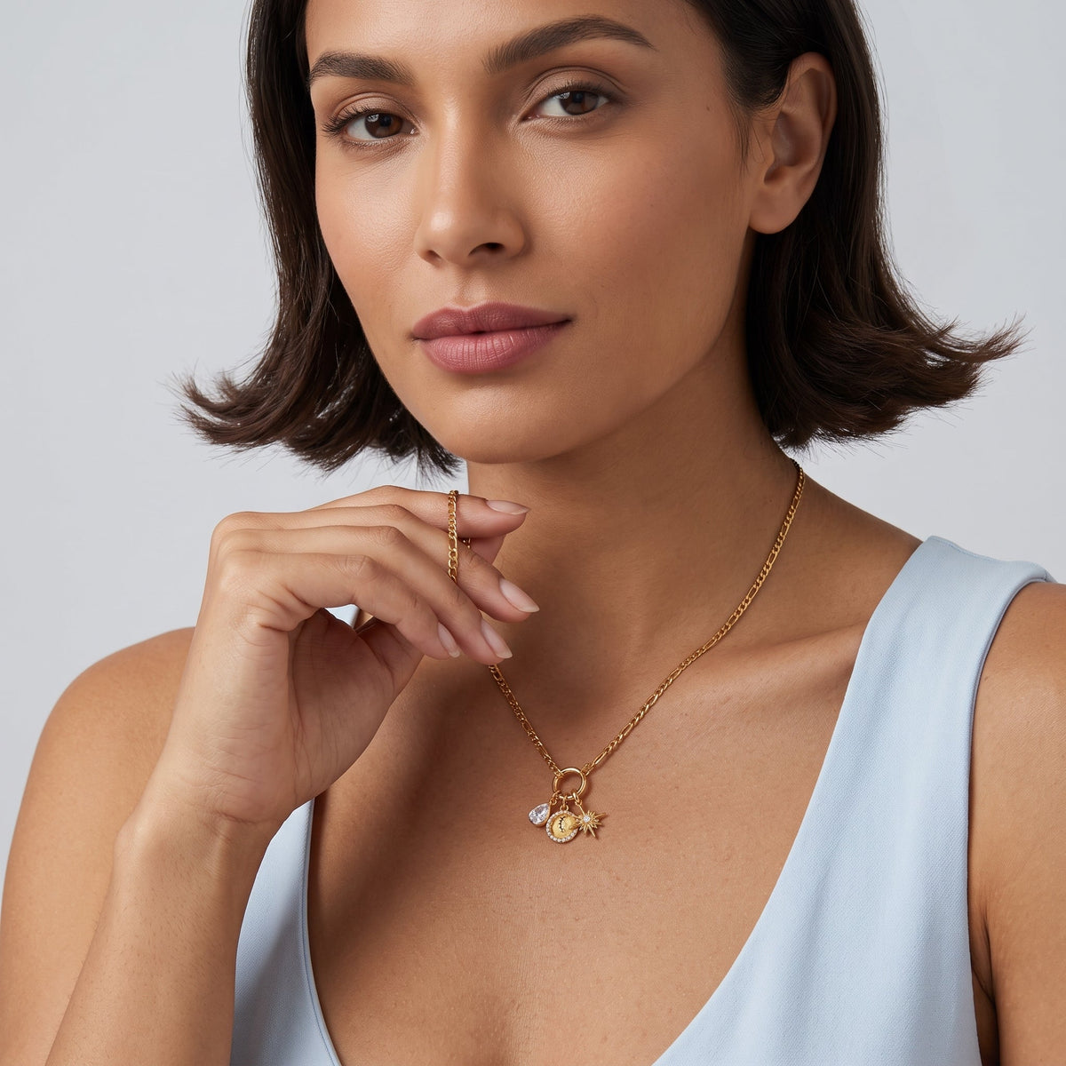 Tennis & Starburst Charm Gold Necklace