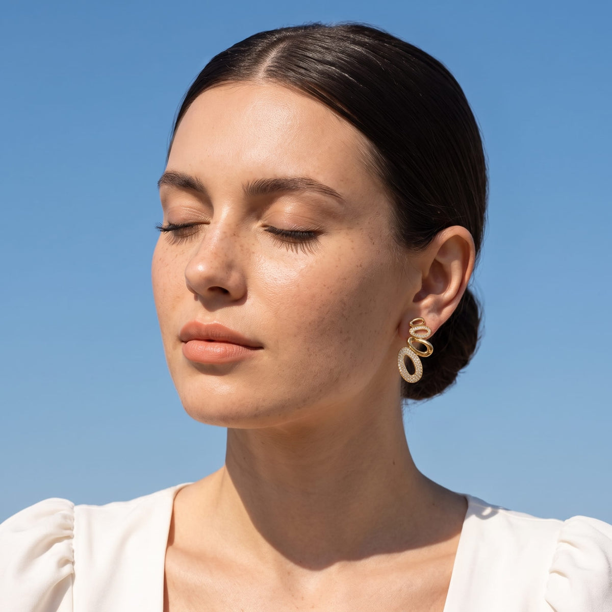 Gold Oval Cascade Earrings