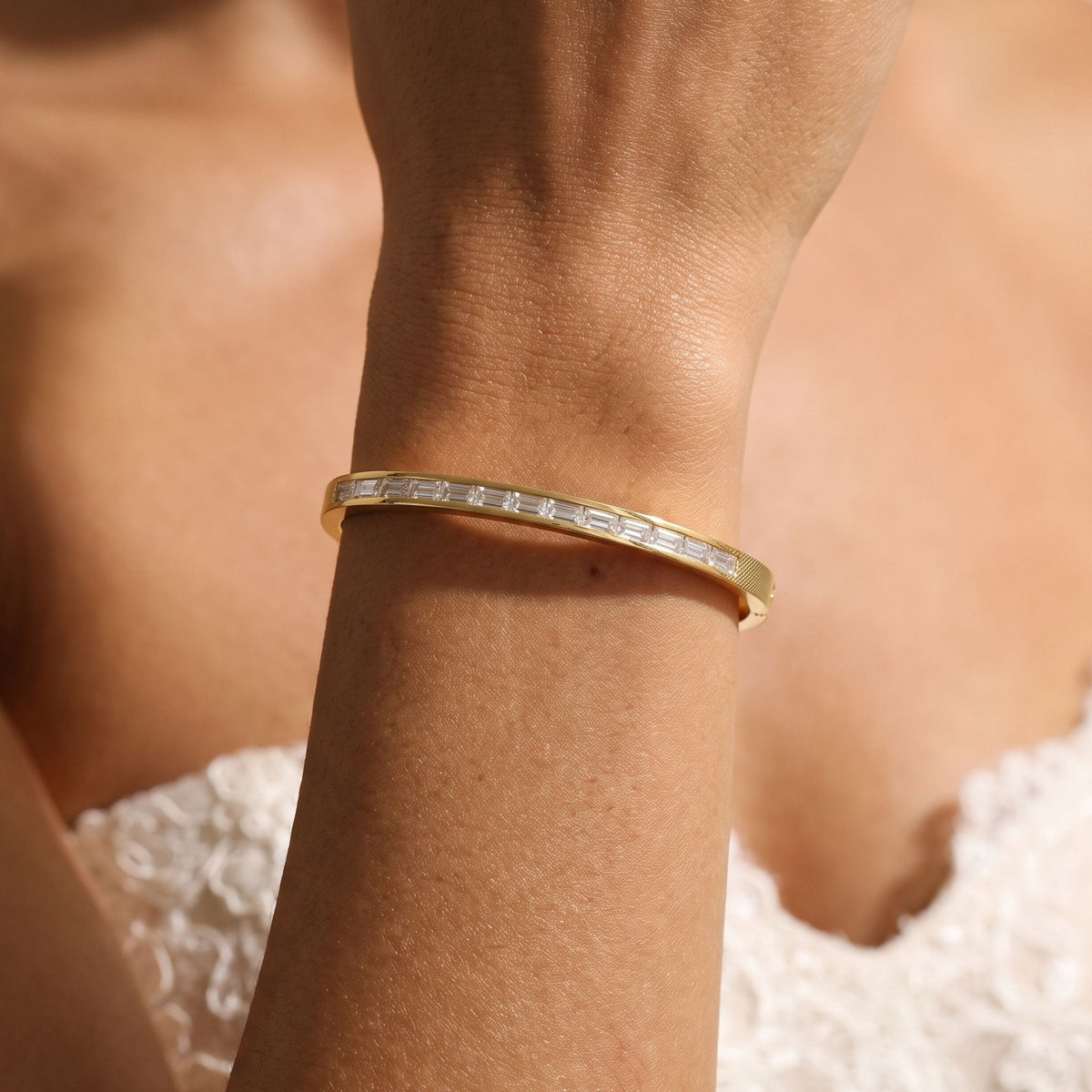 Baguette Bangle worn on the wrist, photographed in natural daylight.