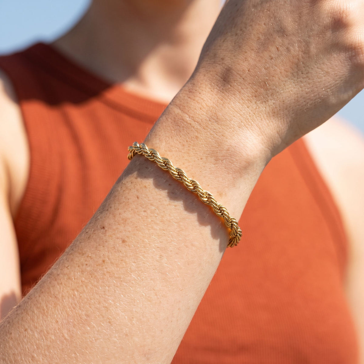 Bold Rope Bracelet worn on the wrist, photographed in natural daylight.