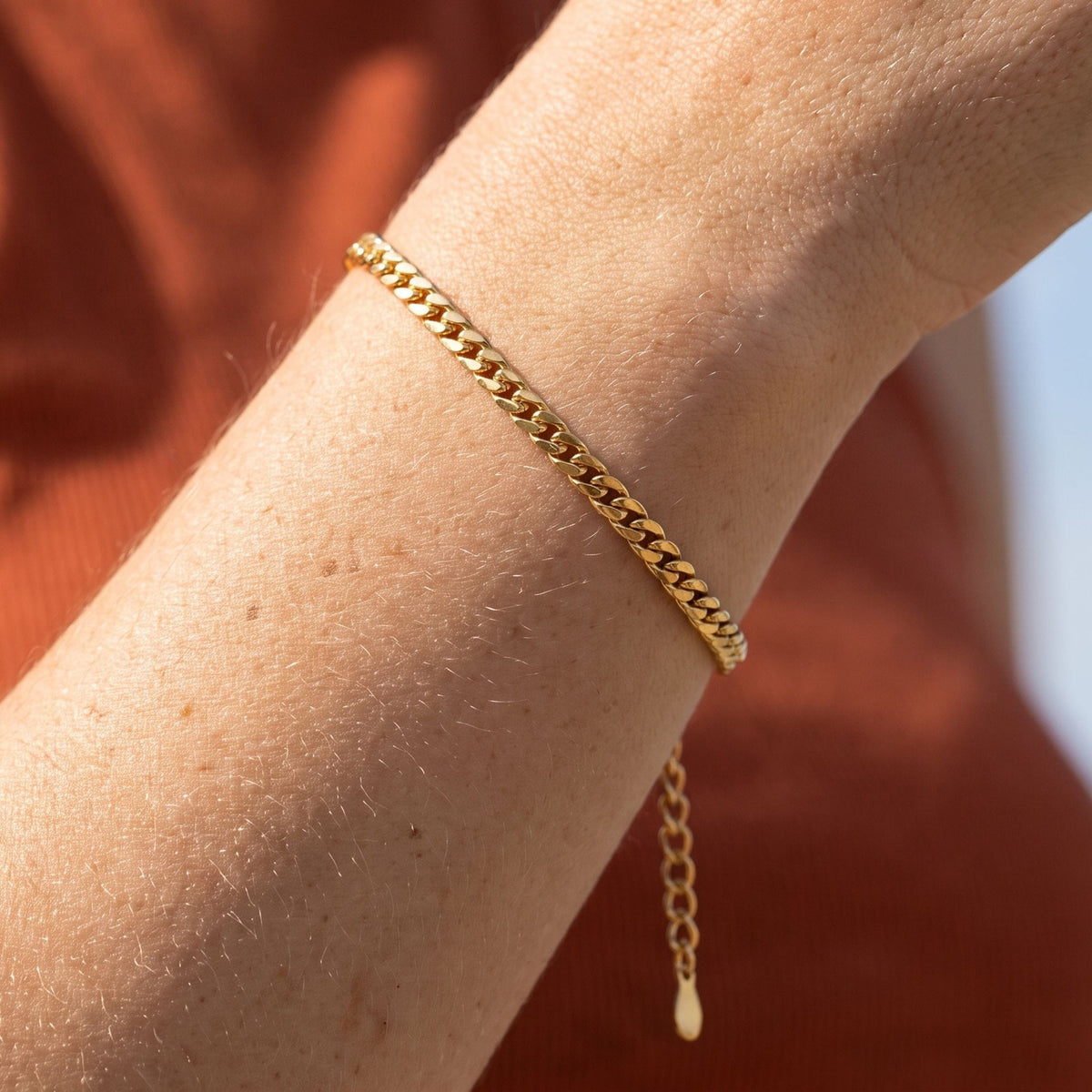 Braided Link Bracelet worn on the wrist, photographed in natural daylight.