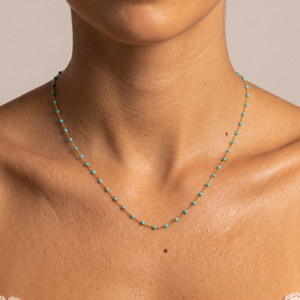 Close-up of the Capri Turquoise Necklace worn on the neckline