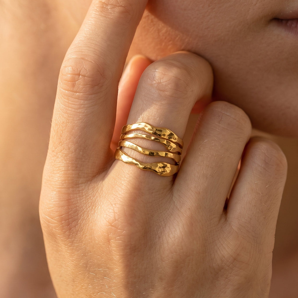 Close-up of the Cascata Ring worn on the finger