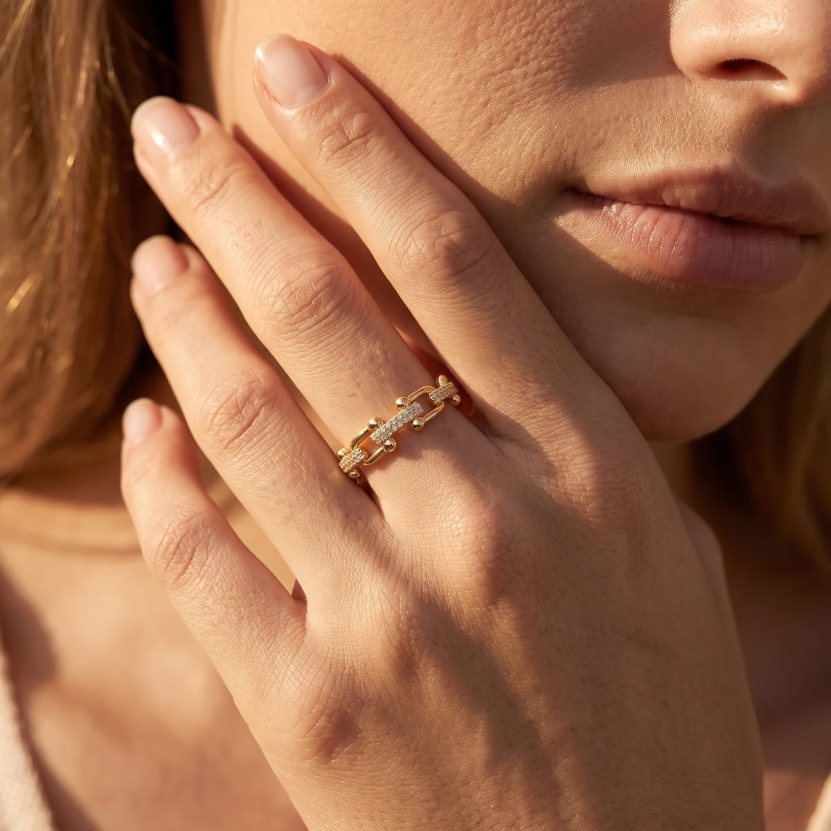 Wider view of a hand wearing the Chain Link Ring