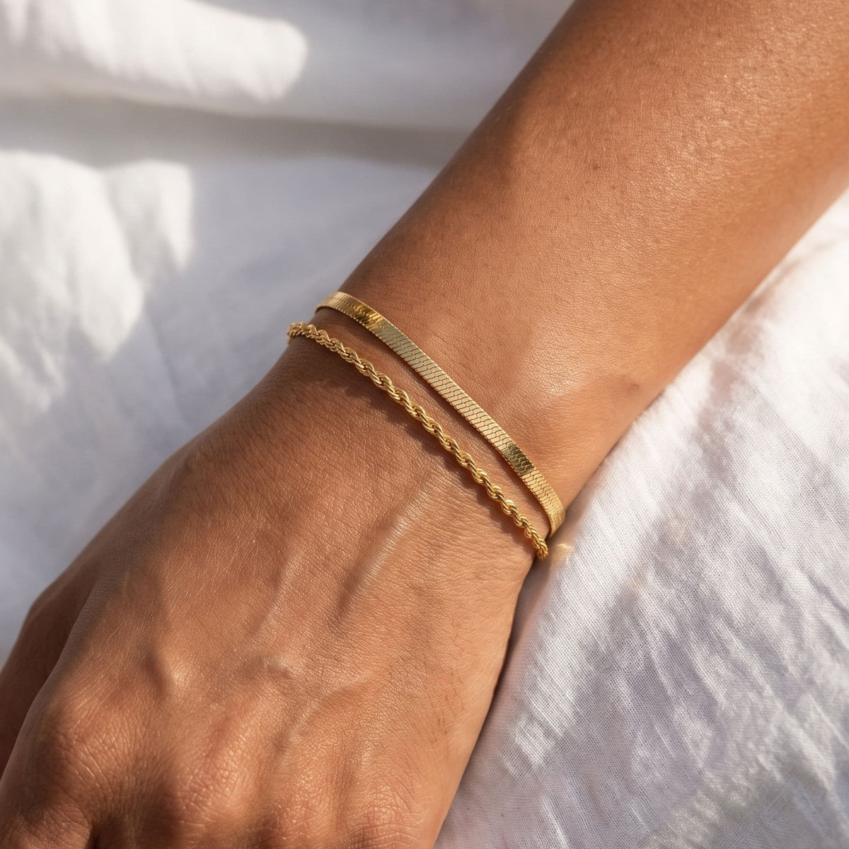 Doppio Bracelet worn on the wrist, photographed in natural daylight.
