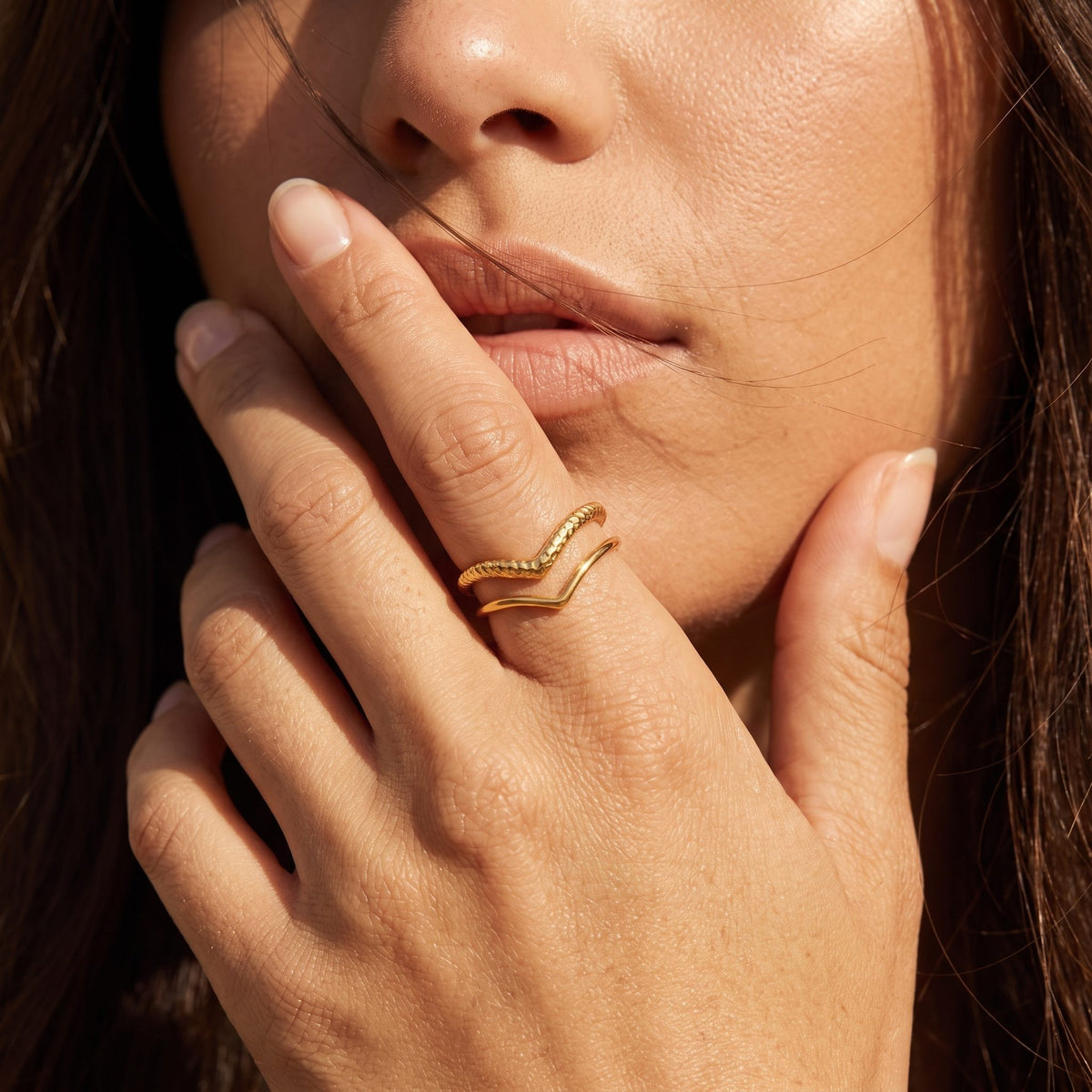 Wider view of a hand wearing the Doppio Ring