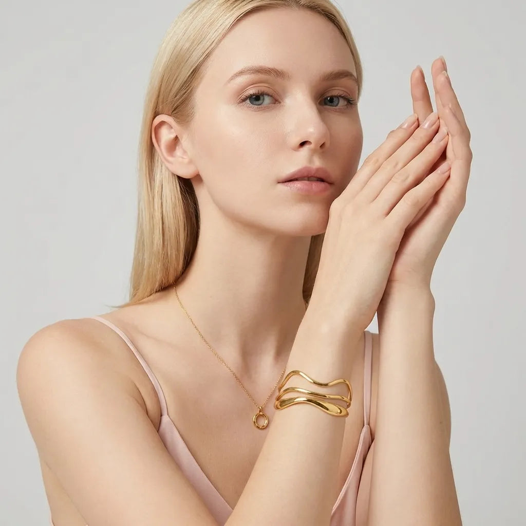 Emma Wave Gold Bangle