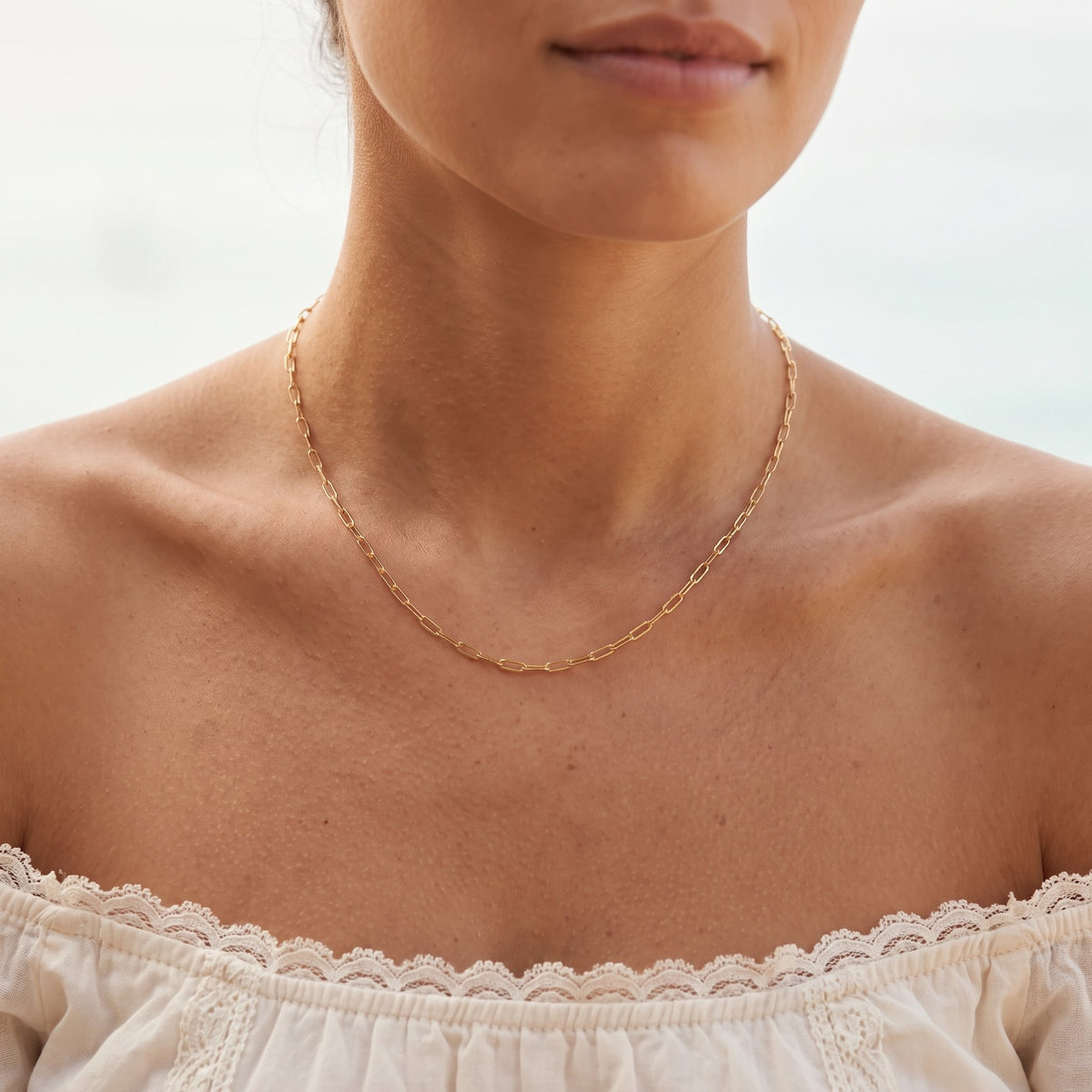 Wider view of a woman wearing the Paperclip Chain Necklace