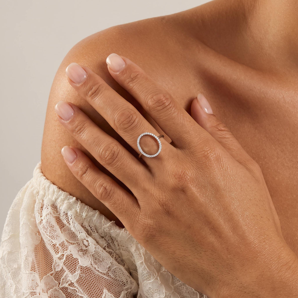 Wider view of a hand wearing the Pavé Oval Ring