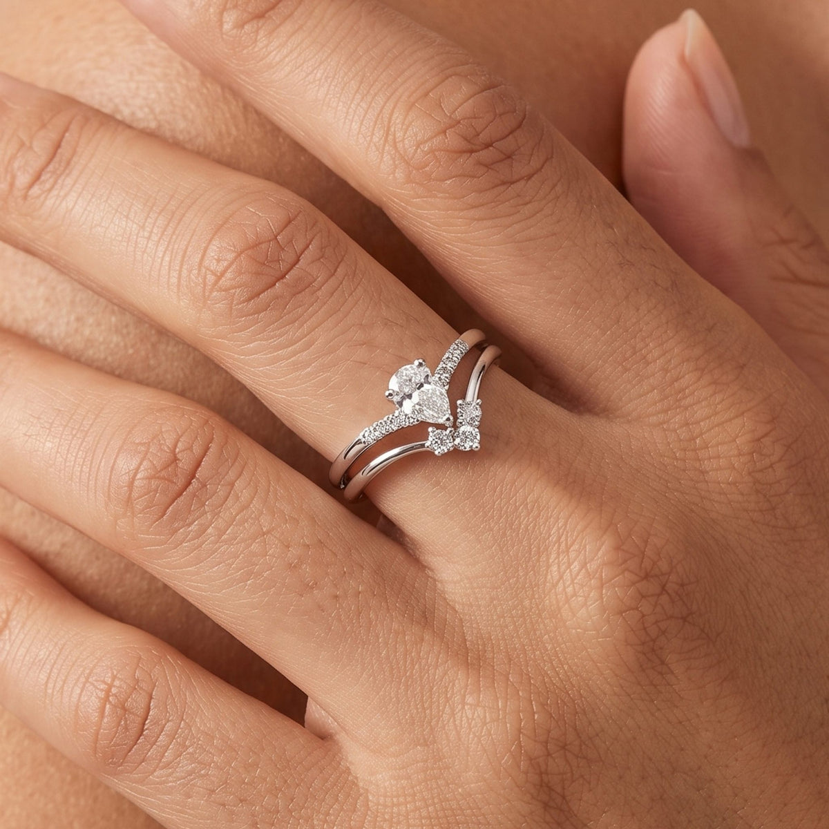 Close-up of the Pear Ring Set worn on the finger