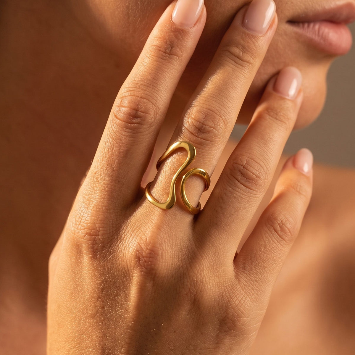 Close-up of the Ribbon Ring worn on the finger