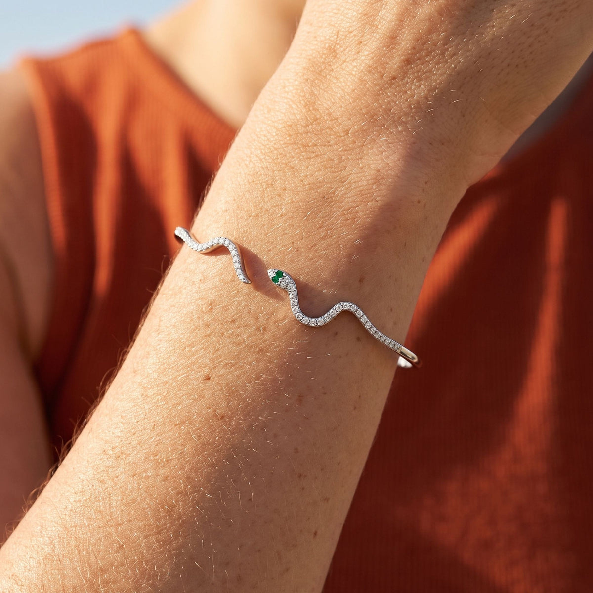 Serpent Cuff worn on the wrist, showing the open ends of the cuff.