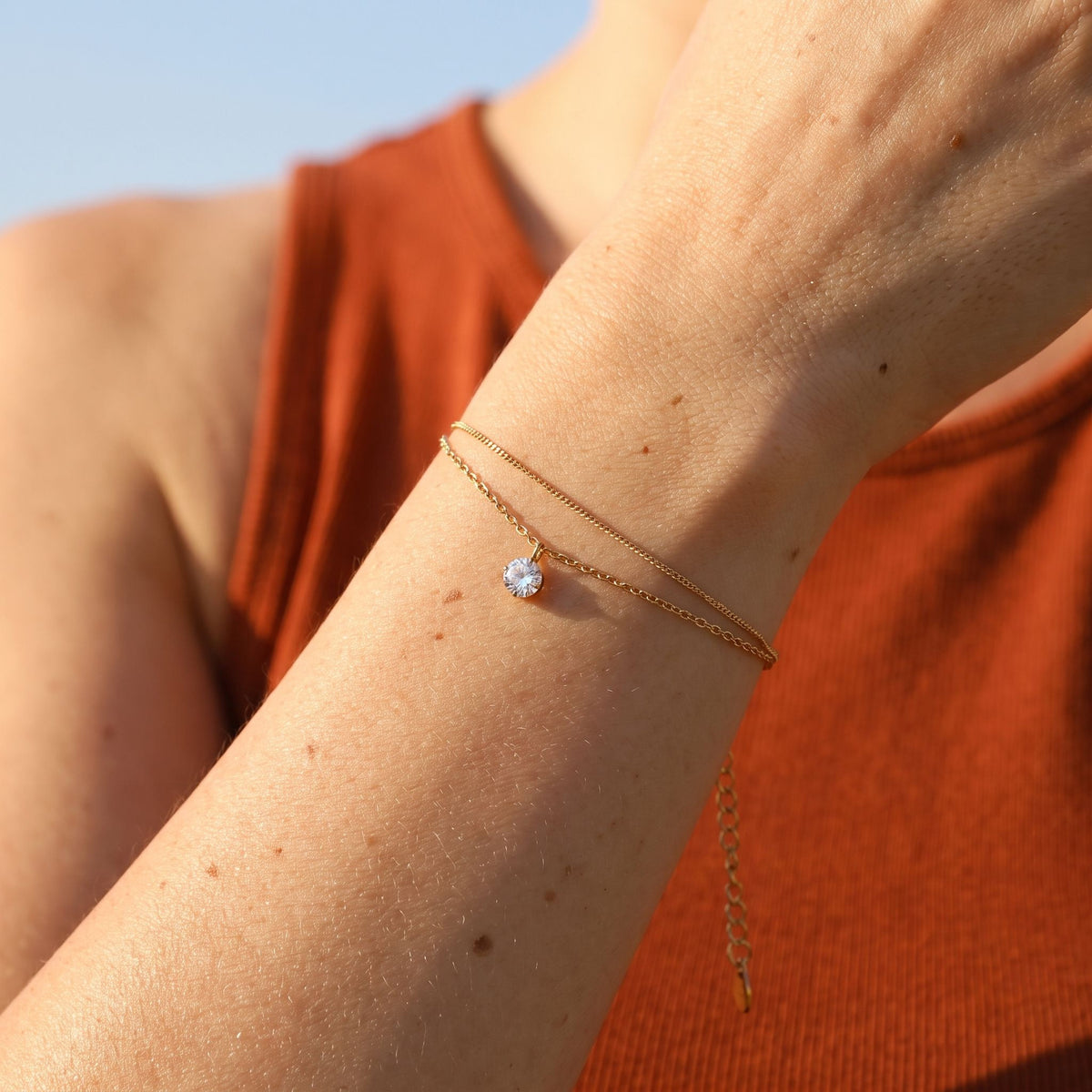 Serpentine Bracelet worn on the wrist, photographed in natural daylight.