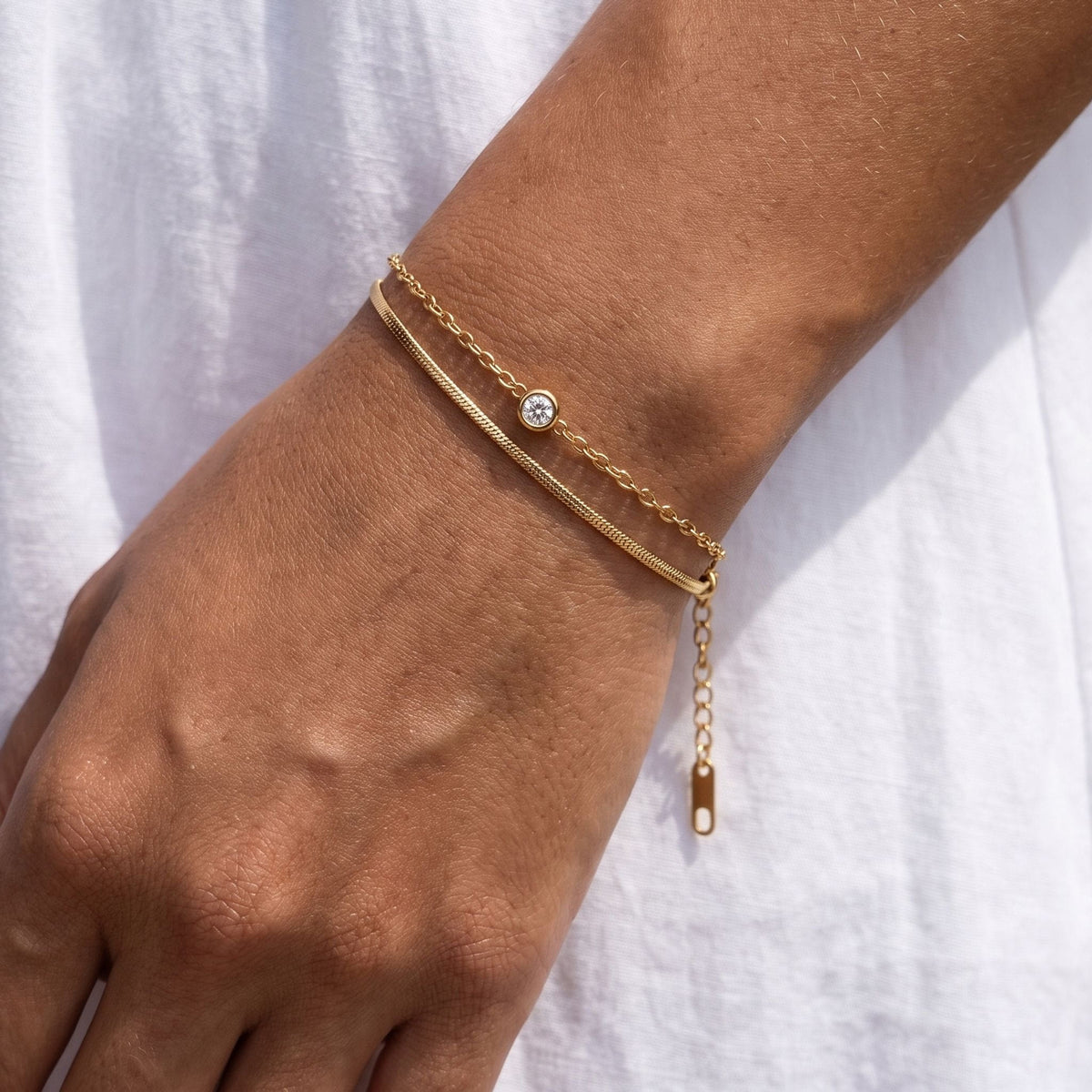 Solitaire Duo Bracelet worn on the wrist, photographed in natural daylight.