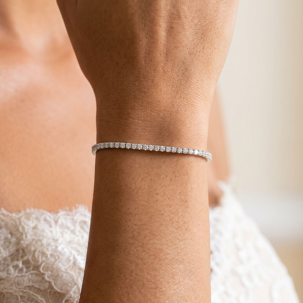 Square Tennis Bracelet worn on the wrist, photographed in natural daylight.