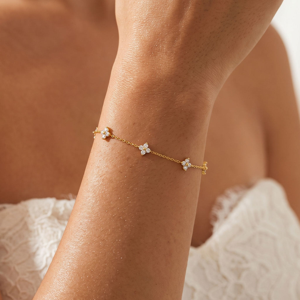 Crystal Clover Bracelet worn on the wrist, photographed in natural daylight.
