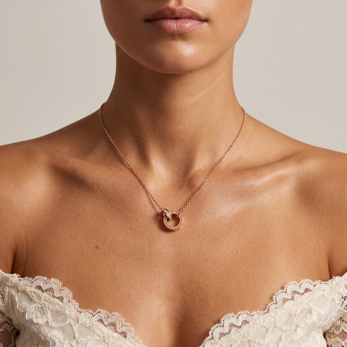 Wider view of a woman wearing the Twin Ring Pendant