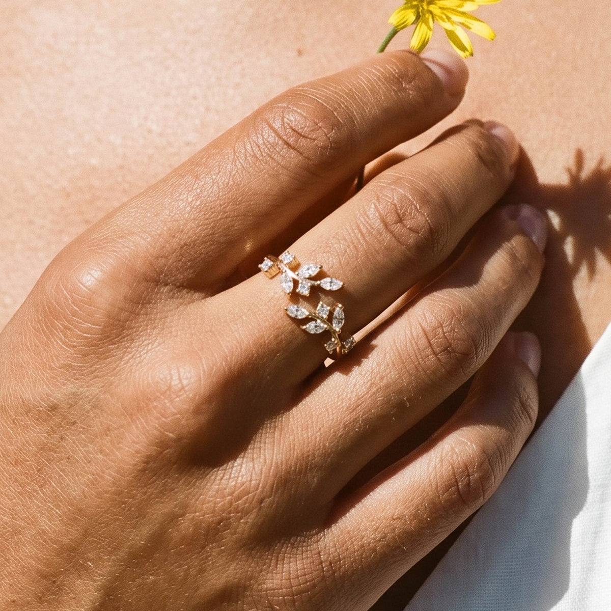 Close-up of the Vine Leaf Ring worn on the finger