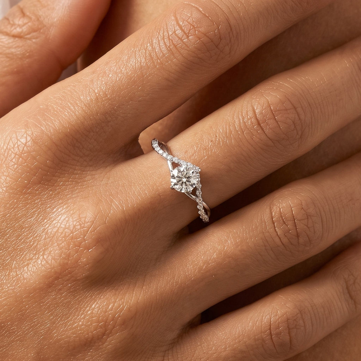 Close-up of the Vine Twist Ring worn on the finger