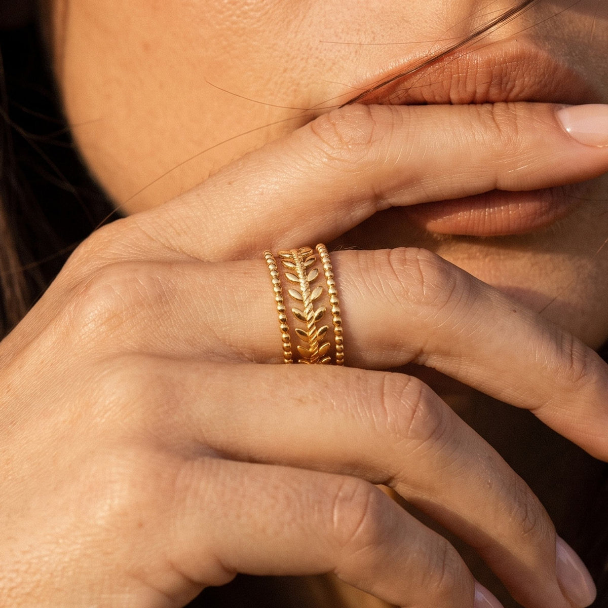 Close-up of the Wheat Leaf Ring worn on the finger