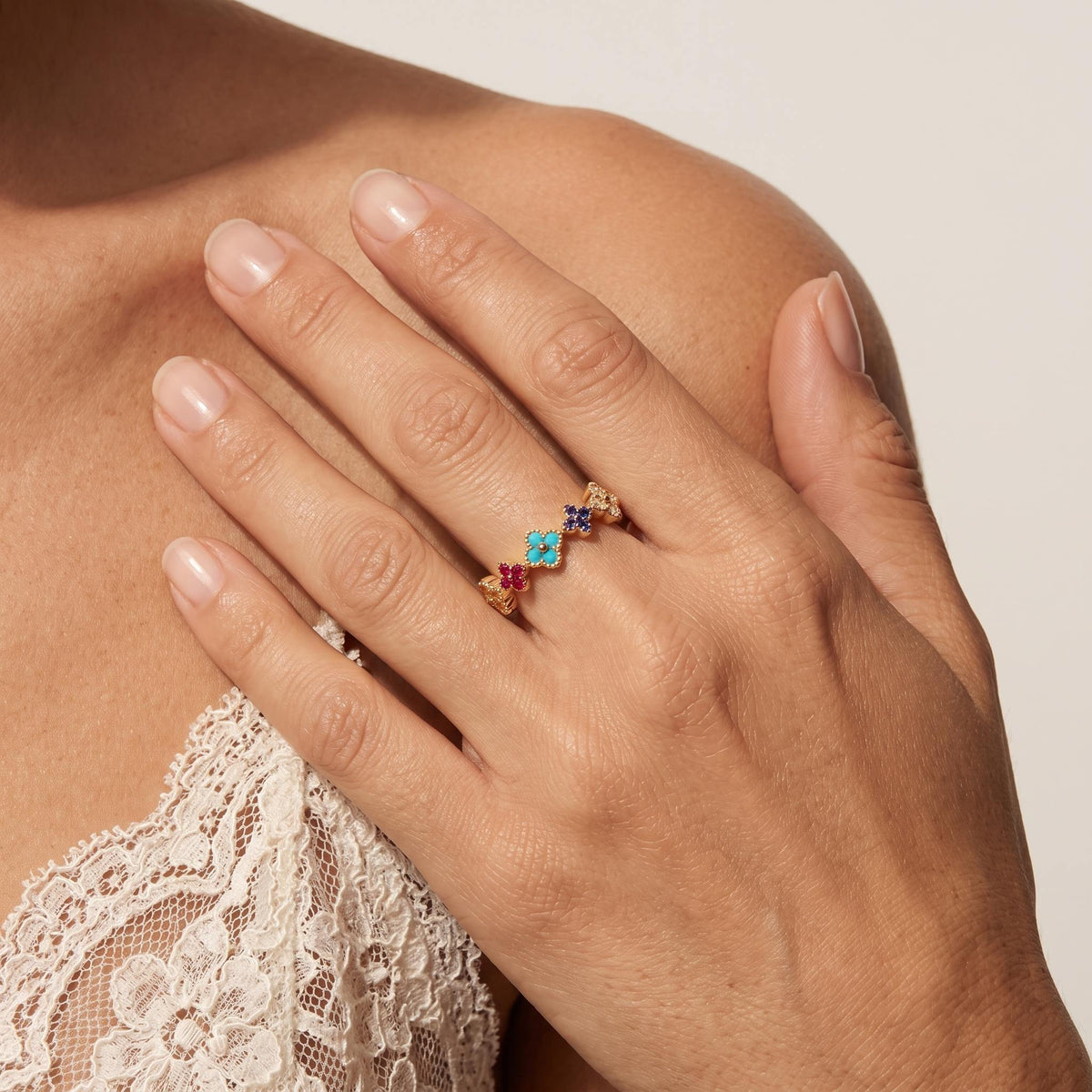 Wider view of a hand wearing the Wildflower Ring