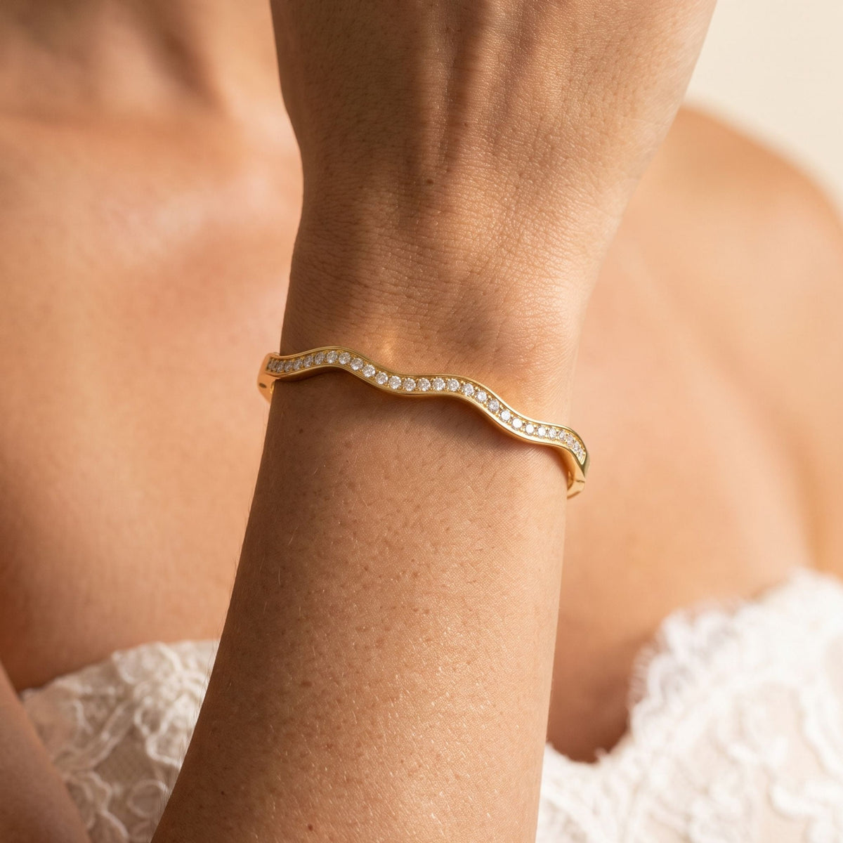 Zigzag Pavé Bangle worn on the wrist, photographed in natural daylight.